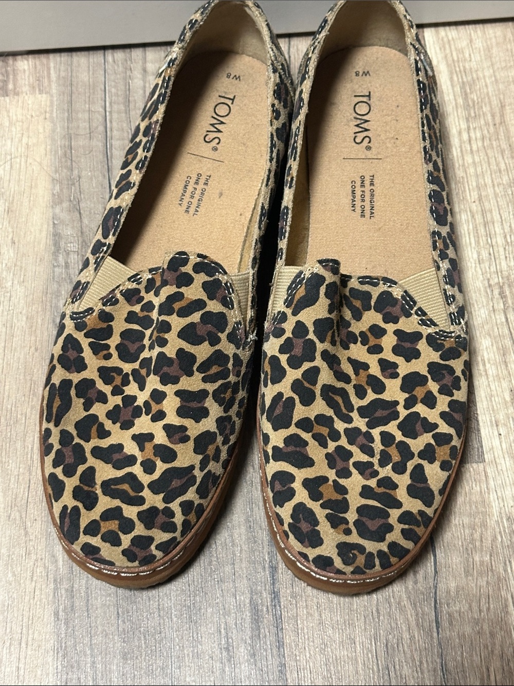 TOMS Leopard Print Slip-On Loafers in Brown and Black